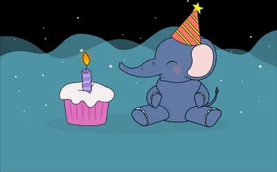 Elephant in a party hat with a birthday cupcake