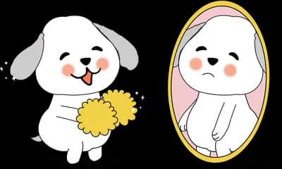 Dog holding flowers before an oval mirror