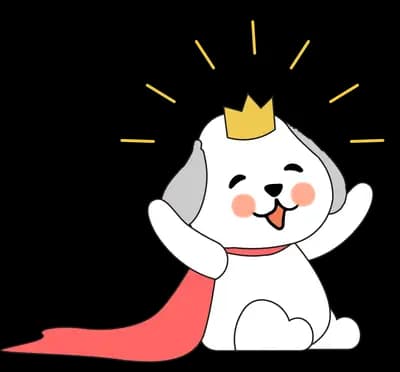 Cat in a crown and red cape sitting proudly