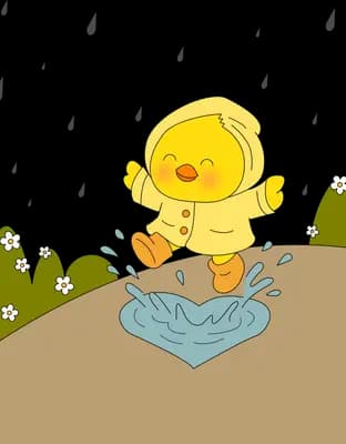 Yellow duckling splashing in a puddle on brown soil