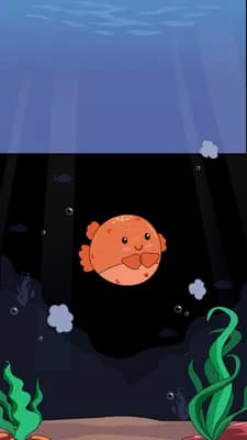 Orange pufferfish hovering over rocks and green seaweed on the sea floor