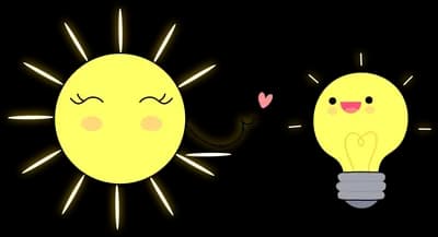 Smiling sun beside a glowing light bulb