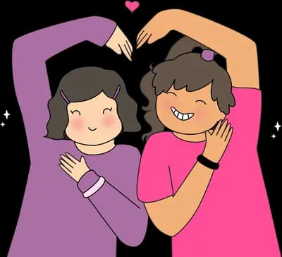 Two women lying head to head forming a heart with their arms
