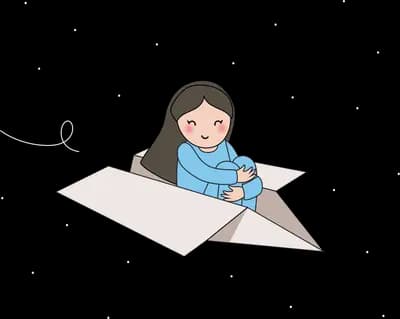 Woman sitting on a large white paper plane