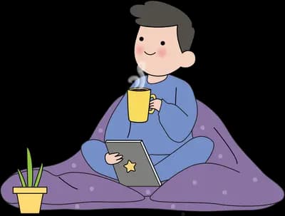 Man under a blanket with a drink and laptop