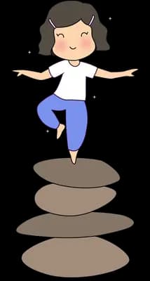 Woman balancing on a stack of smooth stones