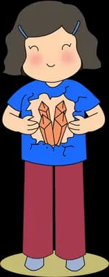 Girl standing holding a cracked heart against her chest