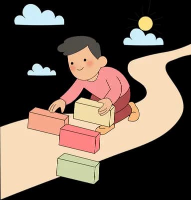 Man kneeling on a path laying coloured bricks to extend the road