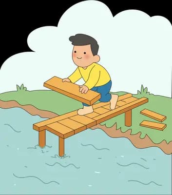 Man kneeling on a wooden jetty laying planks to extend it over the water