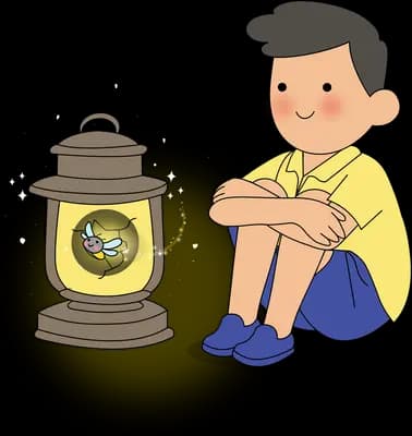 Boy sitting hugging his knees beside a glowing lit oil lantern
