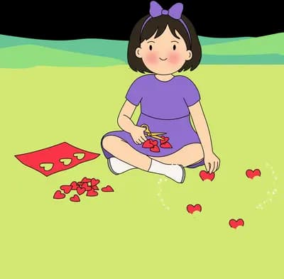Girl making a red flower garland on a bright green lawn