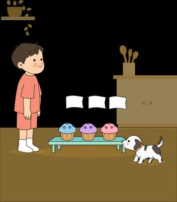 Boy in a mask standing by a bench of three cupcakes while a puppy sniffs around