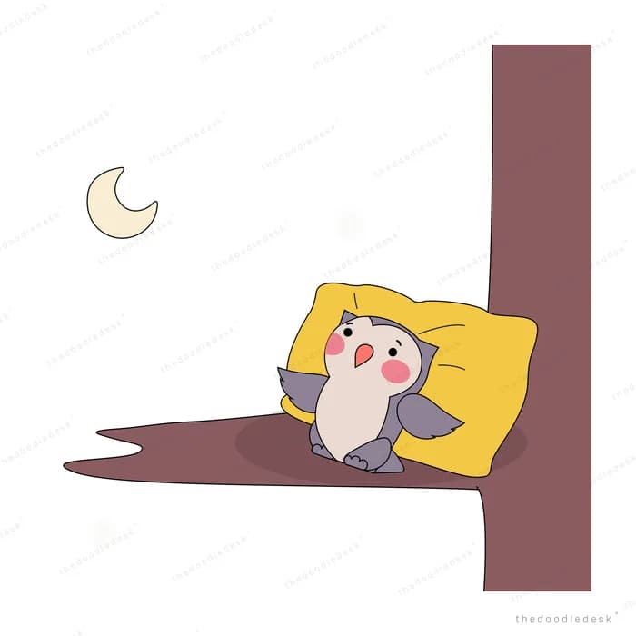 Penguin resting on a yellow cushion by a wall at night