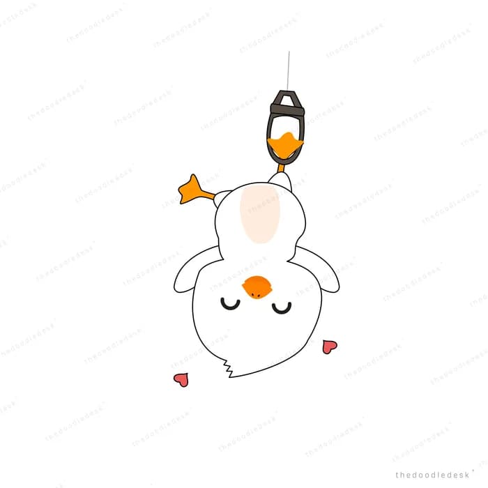 White chick hanging upside down from a rope beside a small bell
