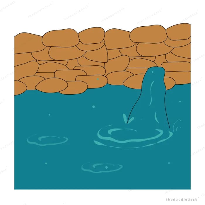 Water gushing through a gap in a stone dam into a teal pool