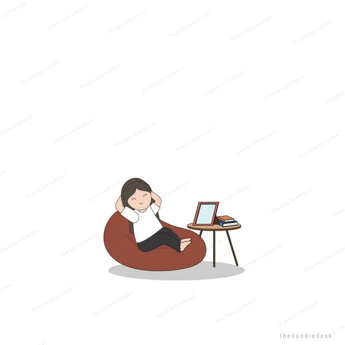 Man reclining in a bean bag watching a small screen