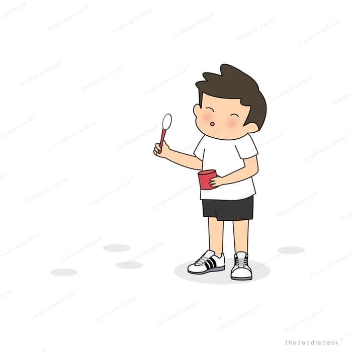 Boy holding up a small light or sparkler