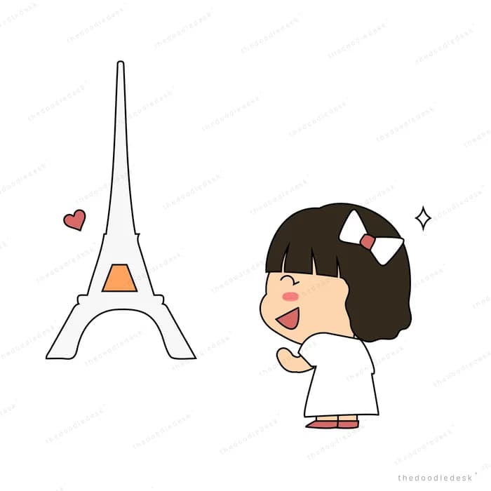 Girl looking at a small Eiffel tower with hearts