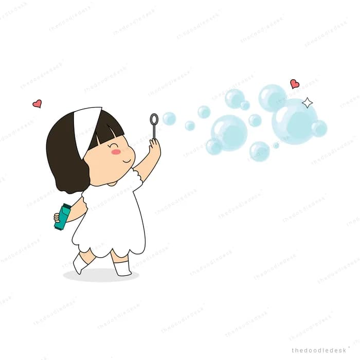 Girl blowing a cluster of soap bubbles