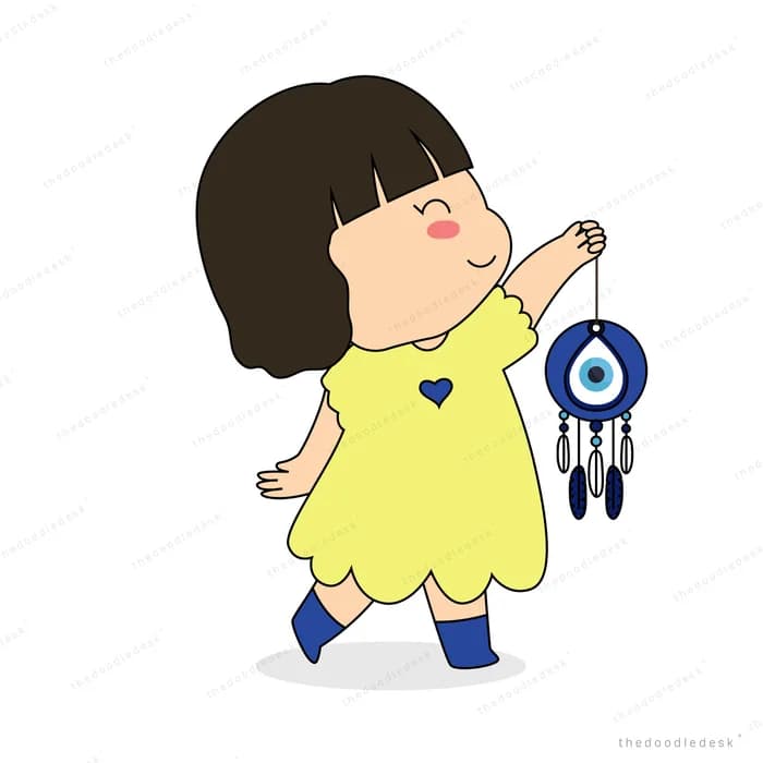 Girl holding a small dreamcatcher