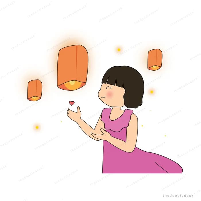Woman releasing floating paper lanterns