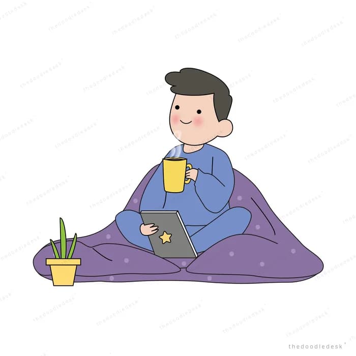 Man under a blanket with a drink and laptop