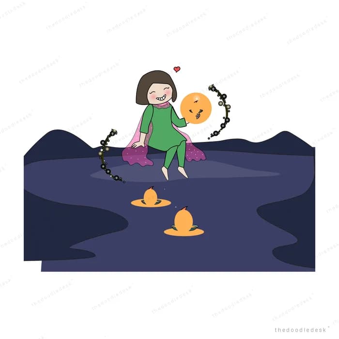 Girl releasing lit lanterns onto dark water
