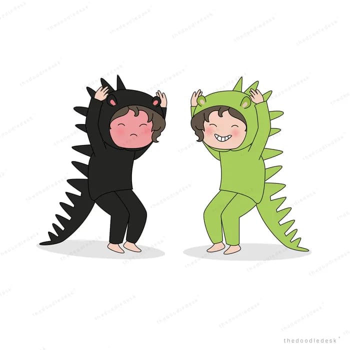 Two children in dinosaur costumes playing