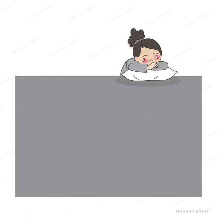 Girl resting her head on a pillow at the top edge of a large blank grey panel