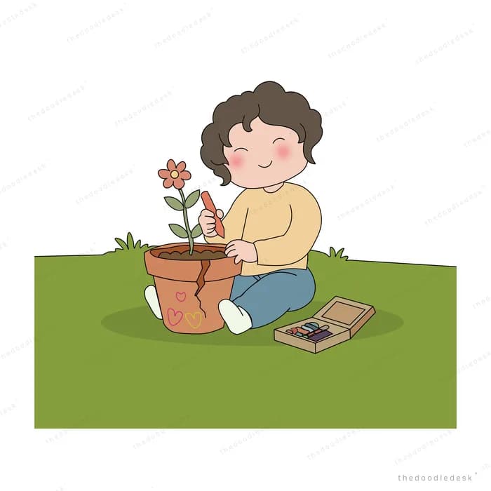 Woman kneeling on grass planting a flower into a terracotta pot with a tool box beside her