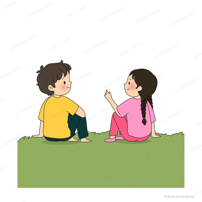 Boy and girl sitting on the grass facing each other in conversation