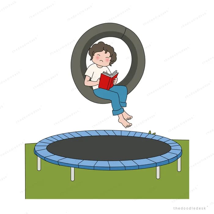 Boy reading in a tyre swing hanging above a blue trampoline
