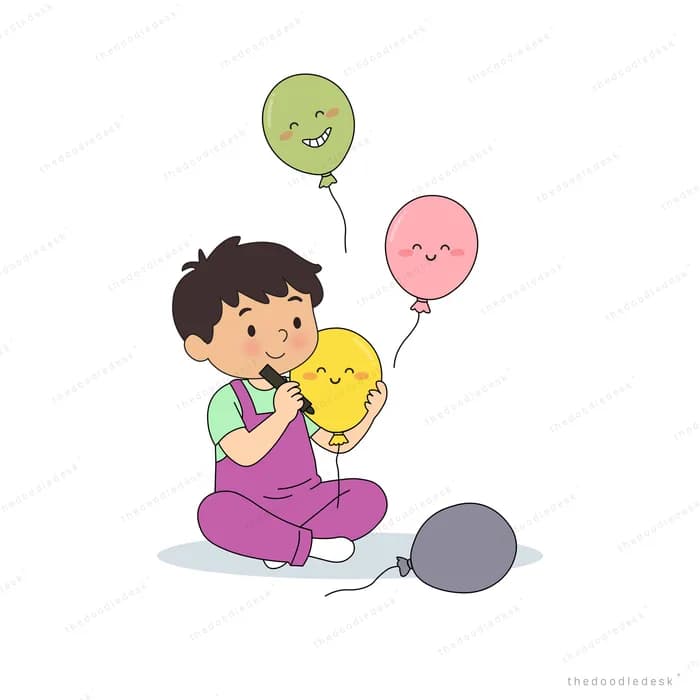 Boy sitting among smiling balloons holding a deflated grey one