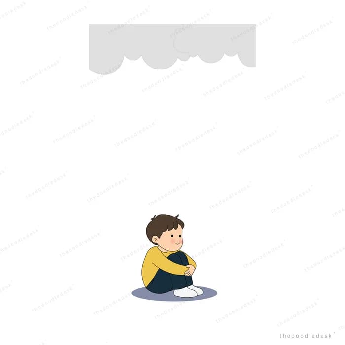 Boy in a yellow jumper hugging his knees beneath a pale grey cloud