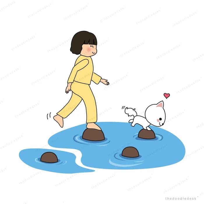 Boy stepping across stones in a puddle with his dog