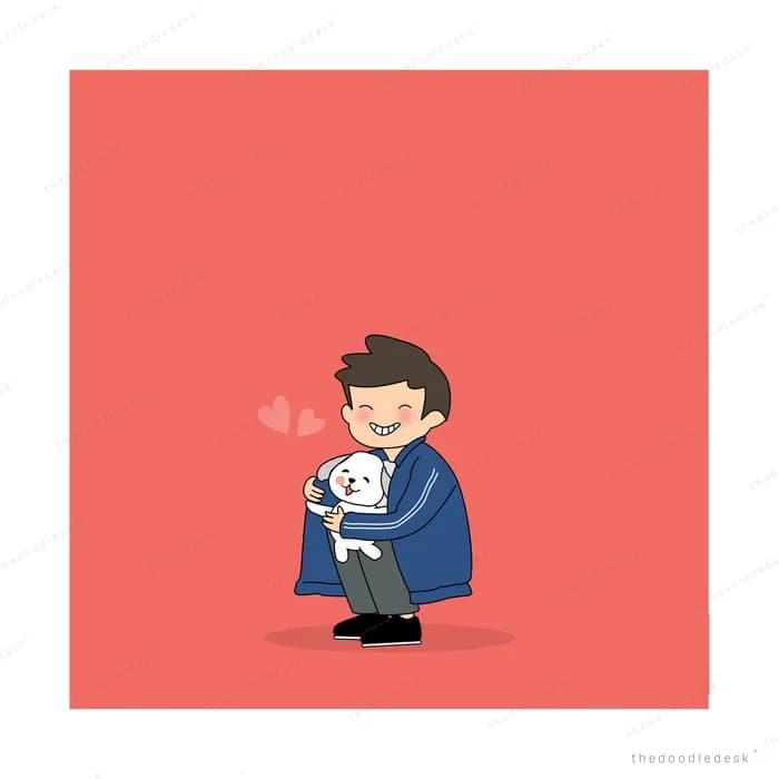 Man kneeling and holding his dog on a red ground