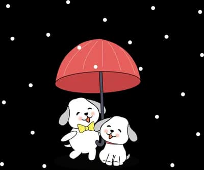 Two dogs sheltering under a red umbrella