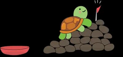 Turtle atop a mound of dark soil