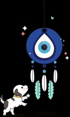 Small white dog leaping up at a hanging nazar evil eye wind chime