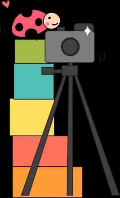 Camera on a tripod stacked over colourful blocks