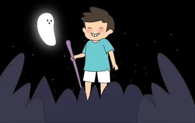 Boy standing on a dark jagged mountain range
