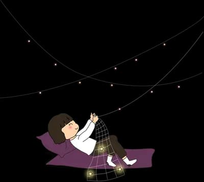 Girl lying on a mat reaching toward floating dots
