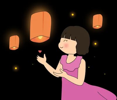 Woman releasing floating paper lanterns
