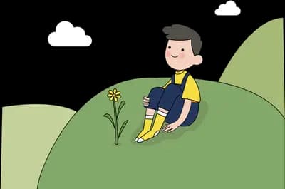 Boy sitting on a green hill under clouds