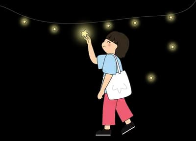 Boy holding a sparkler with stars around