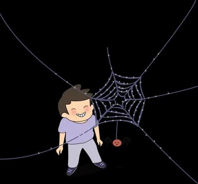 Boy tangled in a large spider web