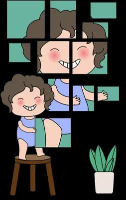 Boy assembling a wall of family photo tiles