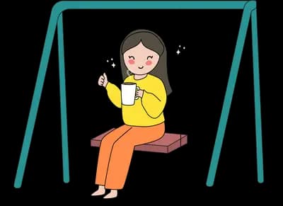 Girl sitting on a swing set