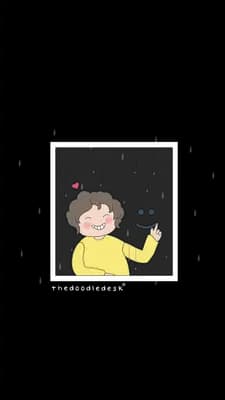 Small boy drawing a smiley face on a rainy window pane