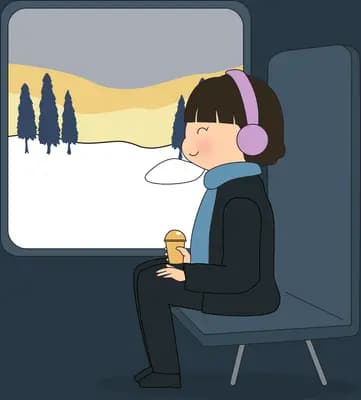 Girl in headphones sitting on a train looking out at a snowy landscape